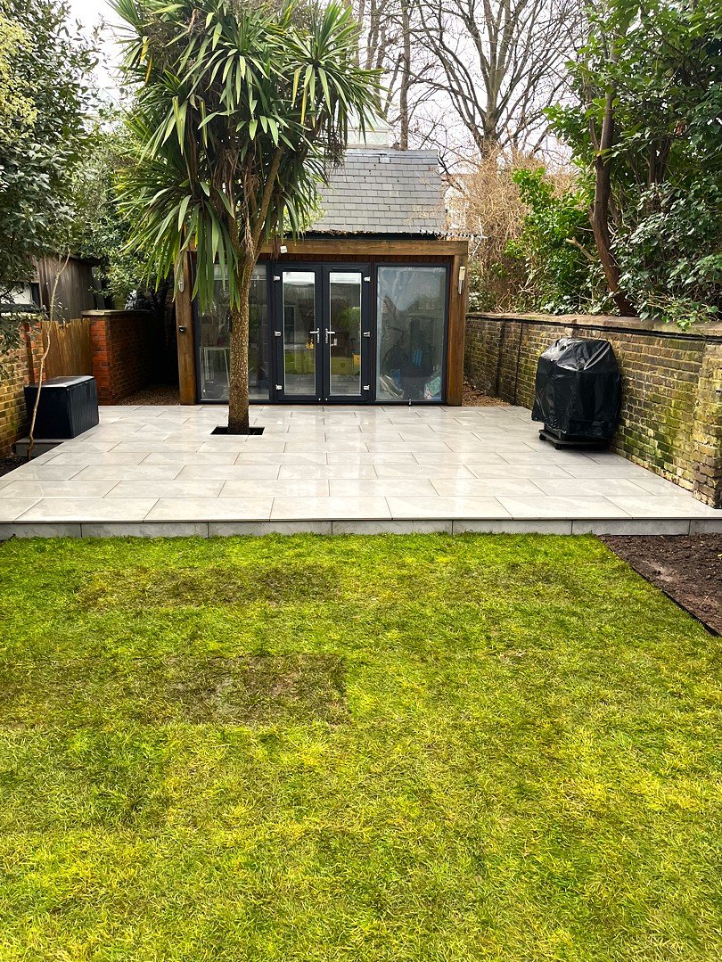 The finished result of a newly designed porcelain patio carried out by Lyuven Garden Maintenance company in Upper Tooting area of London, UK.