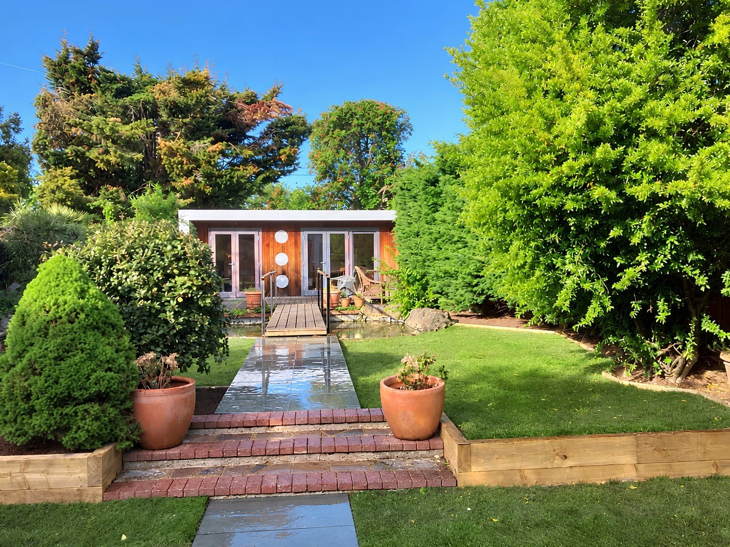 A garden in Morden, London which has had a Lawn, Pathway & Border Redesign carried out by local garden maintenance and landscaping company, Lyuven Ltd.
