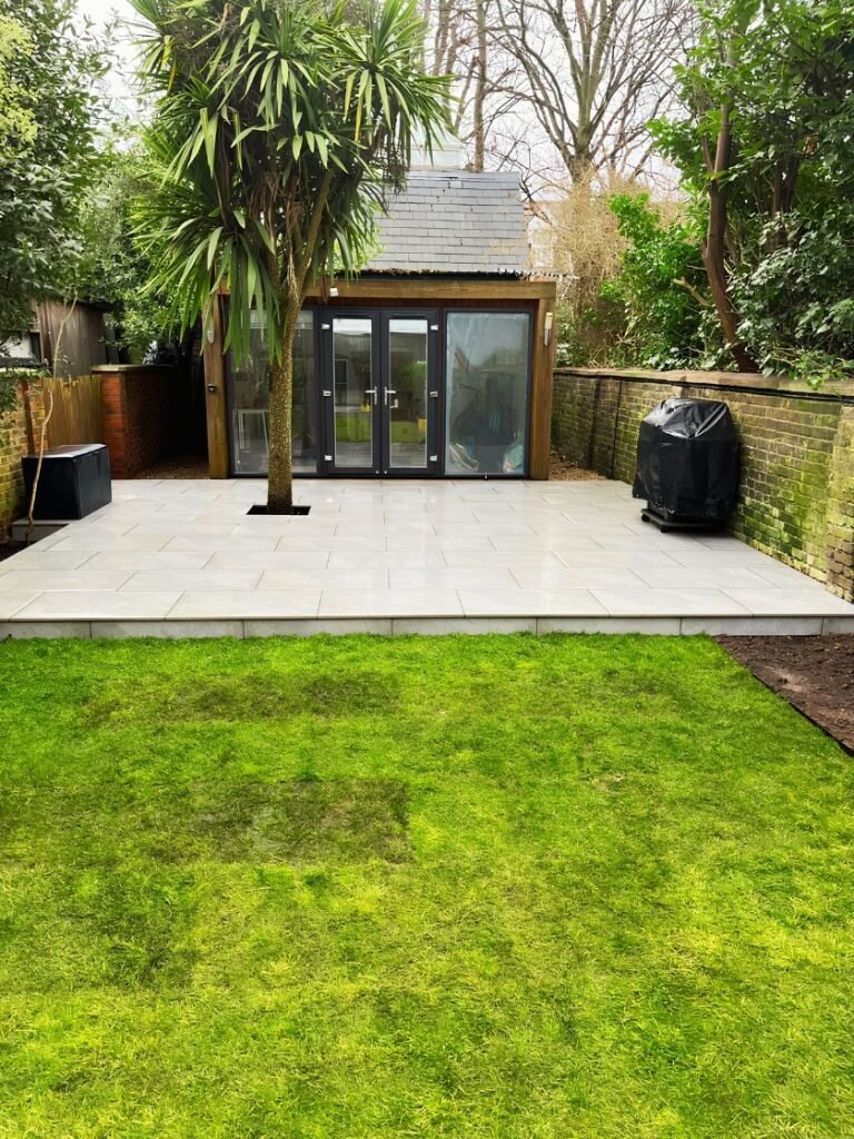 The finished result of a newly designed porcelain patio carried out by Lyuven Garden Maintenance company in Upper Tooting area of London, UK.