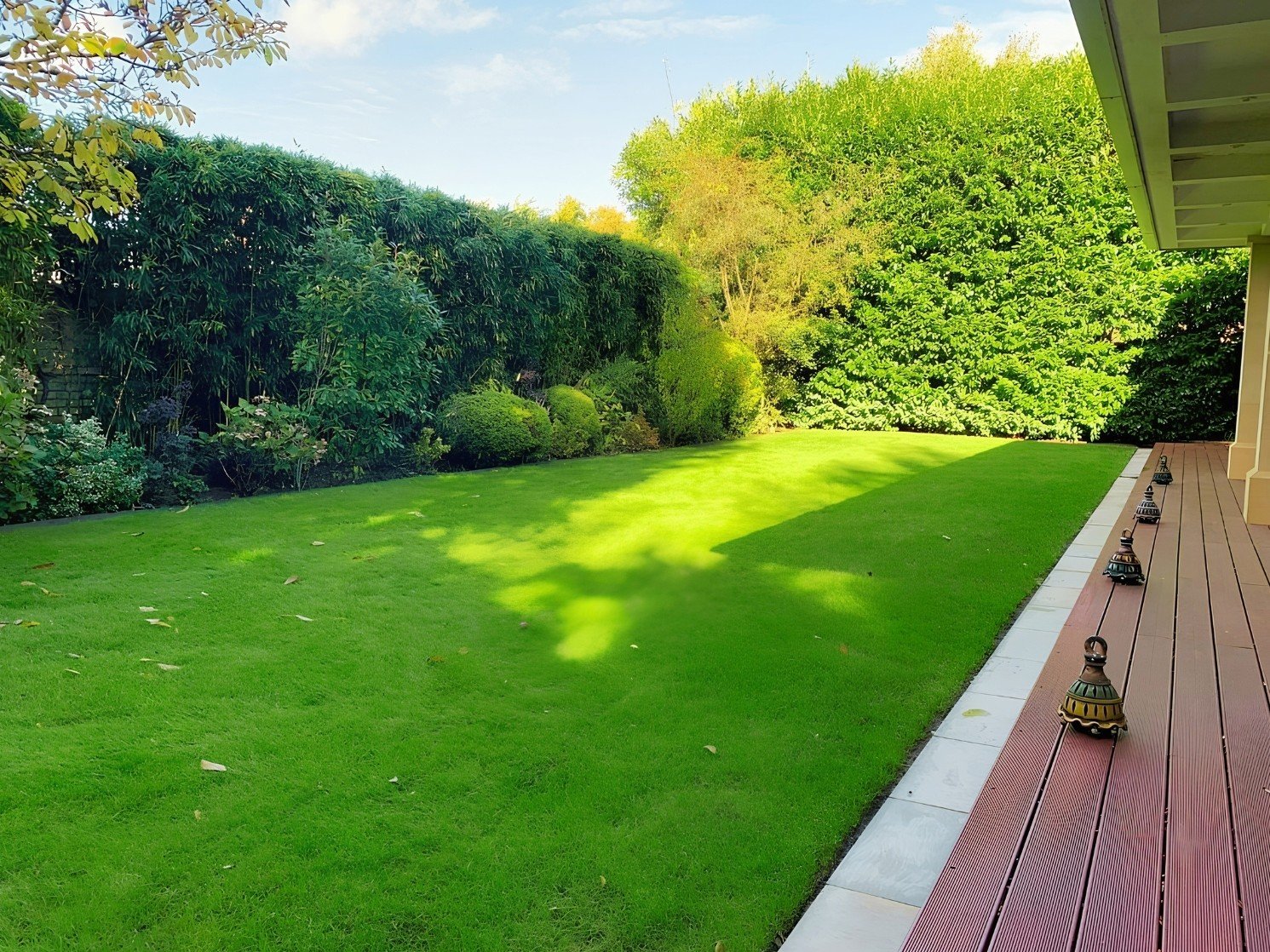 Planting, Decking and Lawn Restoration carried out by Lyuven Garden Maintenance services in Kingston Upon Thames, London.